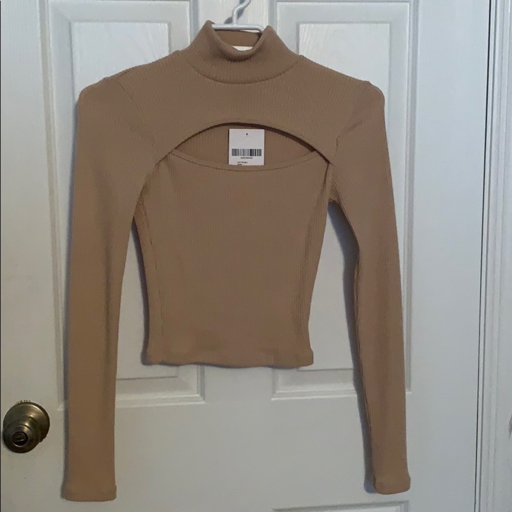 Fitted knit long sleep turtleneck top in taupe.